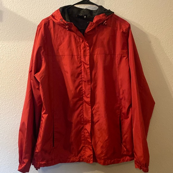 OS rain jacket that also folds into itself size XL - Picture 1 of 6